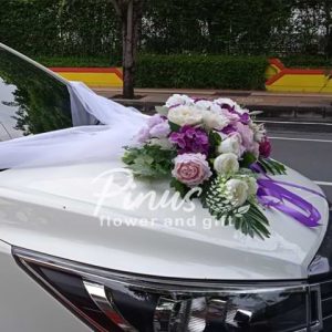 tempat sewa karangan bunga mobil putih pengantin
